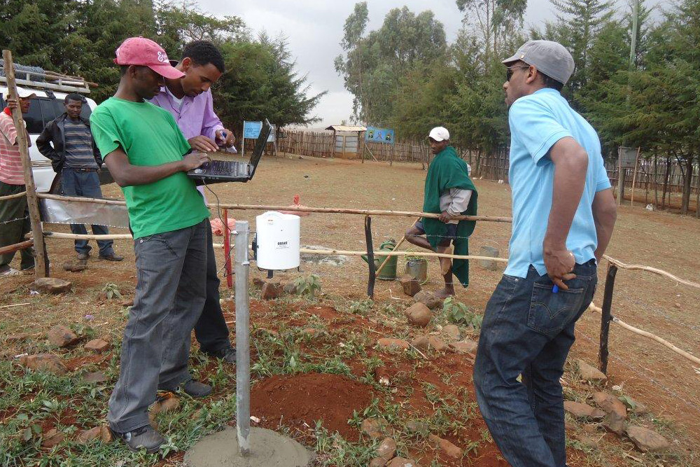 Engineers installing a water system